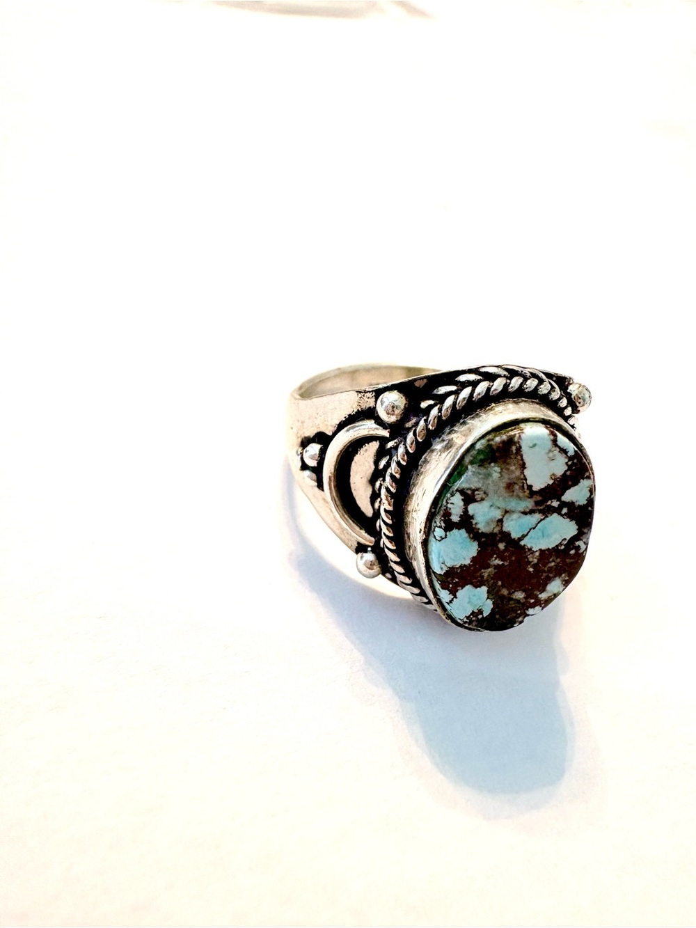 Beautiful, 925 marked, 1/2 inch,, Turquoise ring , with beautiful design, size 8